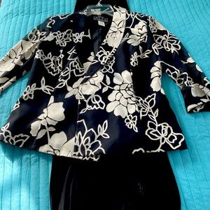 Dressy jacket and black pants.